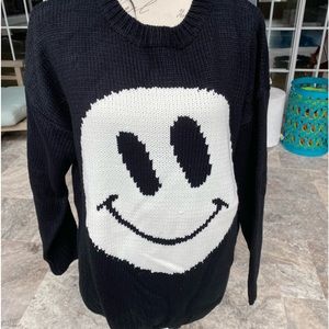 Smile a while black and white sweater